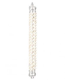 Understated style. Monet's three-row imitation pearl flex bracelet adds just the right amount of decorative detailing for your wardrobe. Further adorned with sparkling Swarovski crystals and glittering glass accents, it's made in silver tone mixed metal. Approximate length: 7-1/2 inches.