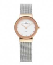 Steel and rose gold create a stunning combination on this lovely watch by Skagen Denmark. Stainless steel mesh bracelet and round rose gold tone case. Silver tone dial features Swarovski elements at markers, two rose gold tone hands and logo. Quartz movement. Water resistant to 30 meters. Limited lifetime warranty.