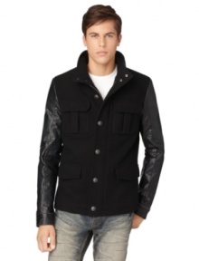 Classic meets edgy in this Calvin Klein Jeans jacket, combining a military style design and leather-like details.