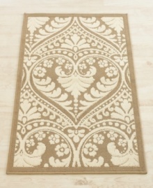 Inspired by traditional damask graphics, the Bellagio accent rug offers a romantic update on this timeless design. Gorgeous ivory and taupe create a textured look with rich Egyptian cotton fibers, making for a soft hand and ultimate durability.