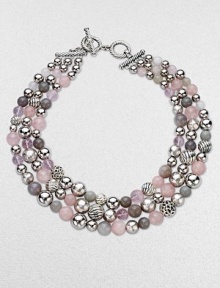 From the Elements Collection. A triple strand of bold beads combines sterling silver, rose quartz, grey chalcedony and grey moonstone in an artful union of rich textures, varied sizes and soft shades.Rose quartz, grey chalcedony and grey moonstoneSterling silverLength, about 18Cable toggle claspImported