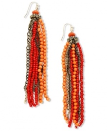 Infuse your look with tassels inspired by the tropics. INC International Concepts' shoulder-dusting style features a red-hot seed bead design in coral-to-red hues. Set in mixed metal. Approximate drop: 4-1/4 inches.