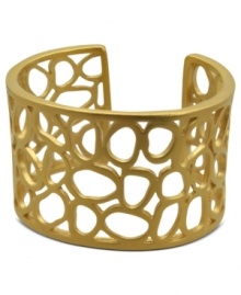 Fashion out in the open. This chic cuff bracelet from T Tahari's Essentials collection boasts a stylish openwork design. Nickel-free for sensitive skin. Crafted in 14k gold-plated mixed metal. Approximate width: 1-11/16 inches.