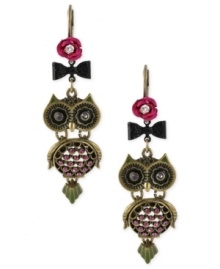 All eyes will be on you with these whimsical owl drop earrings from Betsey Johnson. Crafted from gold-tone mixed metal, the earrings feature glass crystal accents in shades of purple for a colorful touch. Approximate drop: 2-1/2 inches.