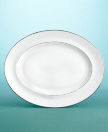 Here, Martha Stewart's design team crafts a modern design with subtle matte mica sheen, similar to mother-of-pearl. An ornate pink lustreware plate in her personal collection inspired the tone-on-tone motif. Two distinct borders adorn the pieces: a latticework border for dinner, salad, and bread-and- butter plates, and scrolling leaf and beach rose borders on accent plates and teacups. Petal Lattice is comprised of design variations in a single setting to inspire you to create your own tabletop style.