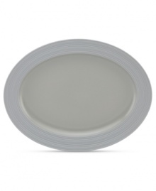 Elegance comes easy with the large Fair Harbor oval platter. Durable stoneware in an oyster-gray hue is half glazed, half matte and totally timeless. From the kate spade new york dinnerware collection.