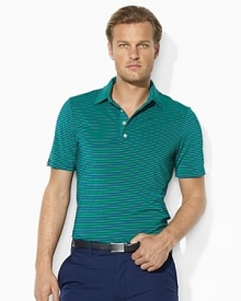 Primed for performance in moisture-wicking stretch jersey, this comfortable polo boasts a handsome striped pattern for the utmost style on and off the course.