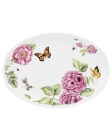 Grow your garden. The Butterfly Meadow Bloom serving platter from Lenox features the sturdy, scalloped porcelain of original Butterfly Meadow dinnerware but with fresh pink and violet blossoms.