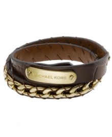 Give yourself the extra edge. A blend of luxurious gold tone mixed metal links and chocolate leather give Michael Kors' latest accessory rock star appeal. Double wrap bracelet is adjustable. Approximate length: 14-1/2 to 16-1/2 inches.