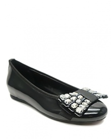 A sleek ballet flat is updated with an oversized rhinestone-encrusted bow, for a glamorous look guaranteed to wow.