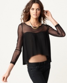 With contrasting sheer swiss dot and accordion pleats, this BCBGeneration boxy top is perfect for a hot urban-edge look!