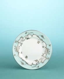 The rolling edges of an antique heirloom plate that caught Martha's fancy are refined here to a spare and contemporary form. Flourish's crisp, clean rim is touched with the lightest blush of Robin's Egg, and draped with berries and leaves. Marrying modernism with the tradition of delicate, intricate drawing, this service becomes a fresh new statement on style and elegance.