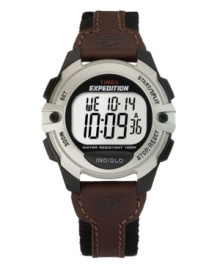 Hit the trail or the track with this rugged Expedition watch by Timex. Brown leather and black canvas strap with round black and silver resin case. Silver tone digital display dial features initial time, day, date and seconds. Quartz movement. Water resistant to 100 meters. One-year limited warranty.