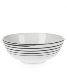 Have fun with the spiral design and serious durability of Mikasa's Cheers vegetable bowl. Bone china in black and white caters modern tables with a sense of whimsy.