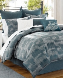 A printed conch shell drawing adds a bit of heirloom appeal to this blue decorative pillow from Tommy Bahama. Pair with the Indigo Ombre bedding ensemble for soothing, casual style.