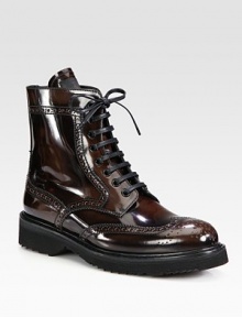 Lace-up design of spazzolato leather with wingtip detailing. Rubber heel, 1¼ (30mm)Rubber platform, ½ (15mm)Compares to a ¾ heel (20mm)Spazzolato leather upperLeather liningRubber solePadded insoleImported