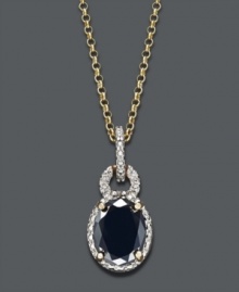 Elegance that transitions from day to evening. Victoria Townsend's polished pendant features an oval-cut sapphire (2-1/5 ct. t.w.) surrounded by an intricate, keyhole pattern of sparkling diamond accents. Setting and chain crafted in 18k gold over sterling silver. Approximate length: 18 inches. Approximate drop: 8/10 inch.