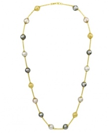 Adorn your neckline with this lustrous illusion necklace by Majorica. Multicolor organic man-made pearls float in a setting of 18k gold over sterling silver. Approximate length: 16 inches.