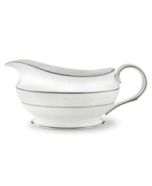 This elegant sauce boat is accented with a delicate flourish of vine-like, white-on-white imprints with raised, iridescent enamel dots. Holds 16 oz. 9 long. From Lenox's dinnerware and dishes collection. Qualifies for Rebate