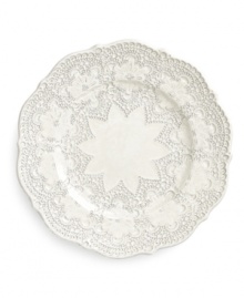 Handcrafted in the Italian tradition, the Merletto salad plate is intricately embellished with a lacy floral texture and painted a creamy antique white. An elegant companion to Arte Italica dinnerware.