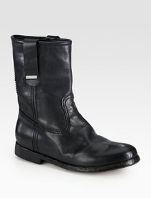 Infuse cool style into your everyday look with this impeccably crafted boot of soft Italian leather. Stacked heel, 1 (25mm)Shaft, 8Leg circumference, 12½Leather upperPull-on styleLeather lining and solePadded insoleMade in Italy