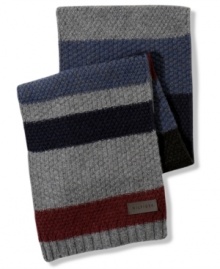 This winter's best accessories have more than a hint of the handknit and homemade. Case in point: Tommy Hilfiger's moss-stitch scarf with its varied, patchwork-patterned stripes.