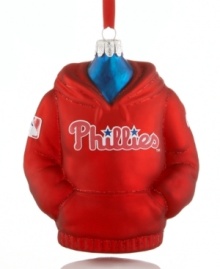 Suit up for Christmas, the Phillies way! Kurt Adler's shiny glass hoodie ornament is a guaranteed home run for Philadelphia baseball fans.