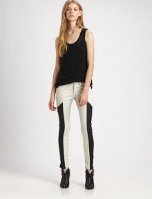 Shift into high-fashion gear with these leggings-style skinnies, defined by contrasting side panels that evoke a sporty vibe. THE FITRise, about 8Inseam, about 30THE DETAILSZip flyFive-pocket styleBody: Cotton/polyurethaneTrim: LeatherMachine washMade in USA of imported fabricModel shown is 5'11 (178cm) wearing US size 4.