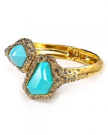 Nod to natural instincts with this gold tone and turquoise bracelet from Alexis Bittar. With inset Swarovski crystals, it's a unique way to amplify your look this season.