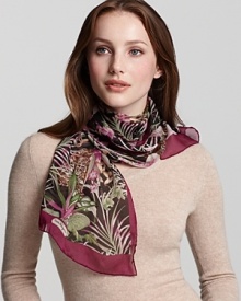 An elegant oblong silk scarf in a large floral print from Salvatore Ferragamo.