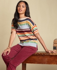 A little bit retro-inspired and totally chic, Tommy Hilfiger's striped sweater is a summer-to-fall classic.