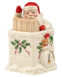 Santa lends a hand at holiday parties, manning a toothpick holder in the shape of a chimney. With gold accents and a holly motif to match the beloved Holiday dinnerware pattern by Lenox.