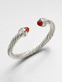 From the Cable Classics Collection. Dazzling diamonds accent this signature sterling silver cable design with carnelian end caps. CarnelianDiamonds, .48 tcwSterling silverDiameter, about 2Slip-on styleImported 