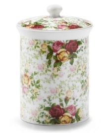 Inspired by traditional floral pottery, the Country Rose Chintz cookie jar evokes all the elegance of the original Old Country Roses pattern but with a more casual feel. Lush pink and gold blossoms thrive on a ground of crisp white porcelain.