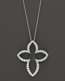 Diamonds set in a 14K. white gold cross pendant.