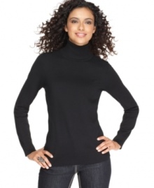 A classic turtleneck sweater never goes out of style; Joseph A's version features a flattering fitted silhouette.