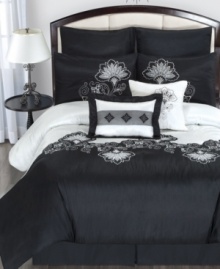 A dramatic black and white palette gives this Esme comforter set a chic and sophisticated look. Embellished with a modern floral pattern, striped accents and a lustrous sheen, these set makes a full impact in the bedroom.