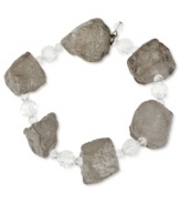 Look like a rock star. This stretch bracelet from Kenneth Cole New York is crafted from hematite-tone mixed metal with semi-precious geometric stones adding an edge and clear glass faceted beads providing the luster. Approximate length: 7-1/2 inches.