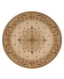 Evoking the opulence of European decor, this round rug features an elegant medallion design in shades of gold on a cream background dotted with rosettes. Woven of premium wool for rich texture and indulgent softness.