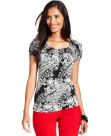 A graphic, intricate print spices up a classic petite top from Style&co. Soft pleating and cap sleeves soften the look.