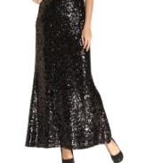 Calvin Klein's sequined maxi skirt makes a sparkling statement at parties this season.