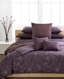 A sweet design. Wine and plum colored elements compose the Elm duvet cover set from Calvin Klein. A muted landscape of leaves add a touch of modern sophistication. Hidden button closure.