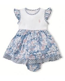 A pretty knit day dress is styled with a charming floral print and contrasting gingham trim.