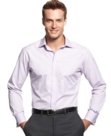 Suit up in style in your business best with this striped shirt from Perry Ellis.