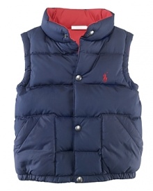 The Reversible Elmwood Puffer Vest is crafted from channel-stitched microfiber for versatility and lightweight warmth.