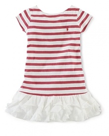 Sweet cascading ruffles adorn the hem of a striped jersey dress for girlish flair.