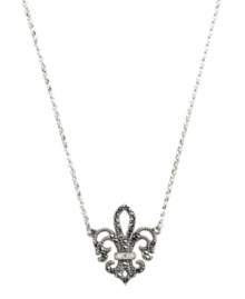 Add a little regal resplendence to your look. Judith Jack's stunning Fleur De Lis pendant features an intricate cut-out design accented by glittering marcasite and clear crystal. Set in sterling silver. Approximate length: 16 inches. Approximate drop: 7/8 inch.