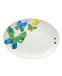 Flight of fancy. Emblazoned with an enchanting butterfly motif, the vividly hued Papillion Dream oval platter from Vera adds a delightful touch of whimsy to any table. (Clearance)