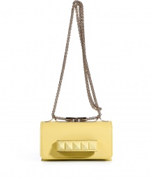 Inject a dose of hard-edge elegance into your outfit with Valentinos soft yellow leather tonal rockstud shoulder bag, detailed with a front handle perfect for converting into a covetable clutch - Flap with magnetic snap closure underneath, tonal rockstud-adorned front handle, removable chain-link shoulder strap, accordion style with 2 internal sections, inside back wall credit card slot - Carry as a polish to cocktail dresses or tailored separates