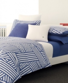 A new twist on nautical. Lacoste's Regate comforter set dresses your bed in seaworthy style with a bold print of intertwined, layered stripes in dutch blue and pure white. Featuring pure cotton twill; shams feature overlap closure. (Clearance)